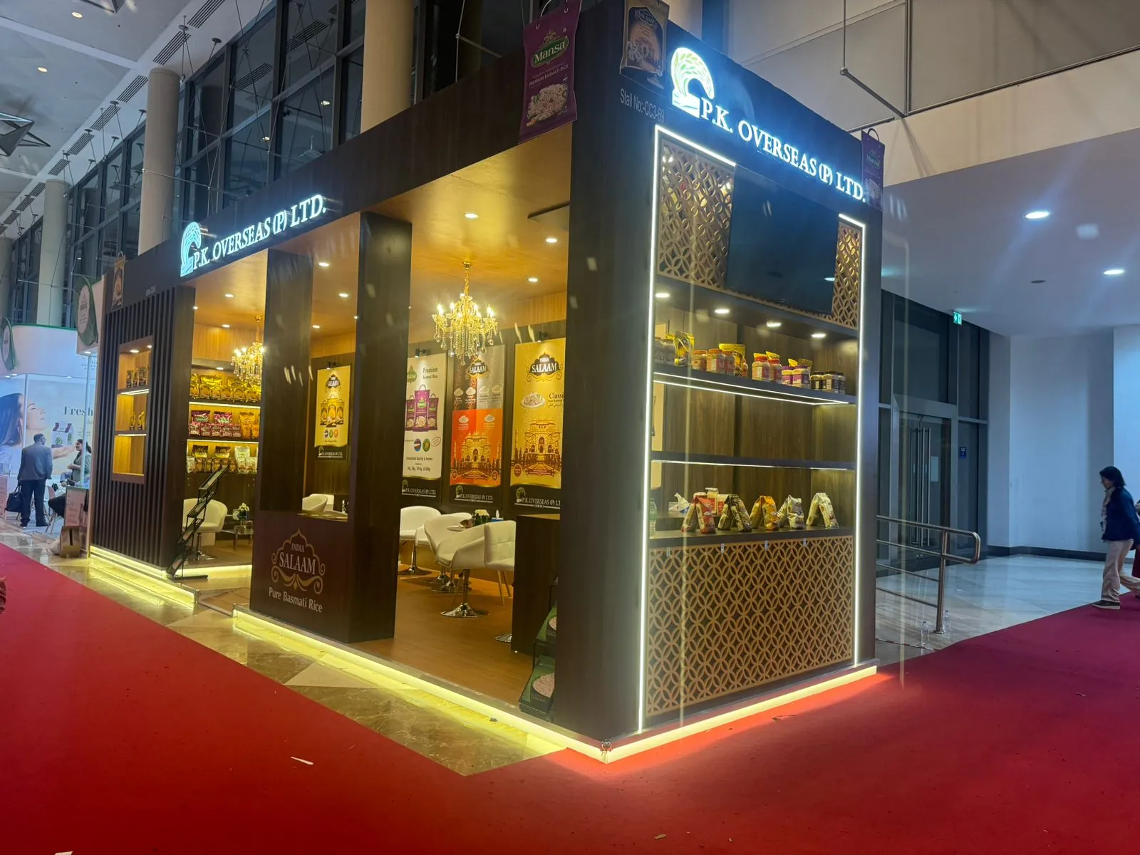 MK Overseas stand with gold lighting at Gulfood 2024