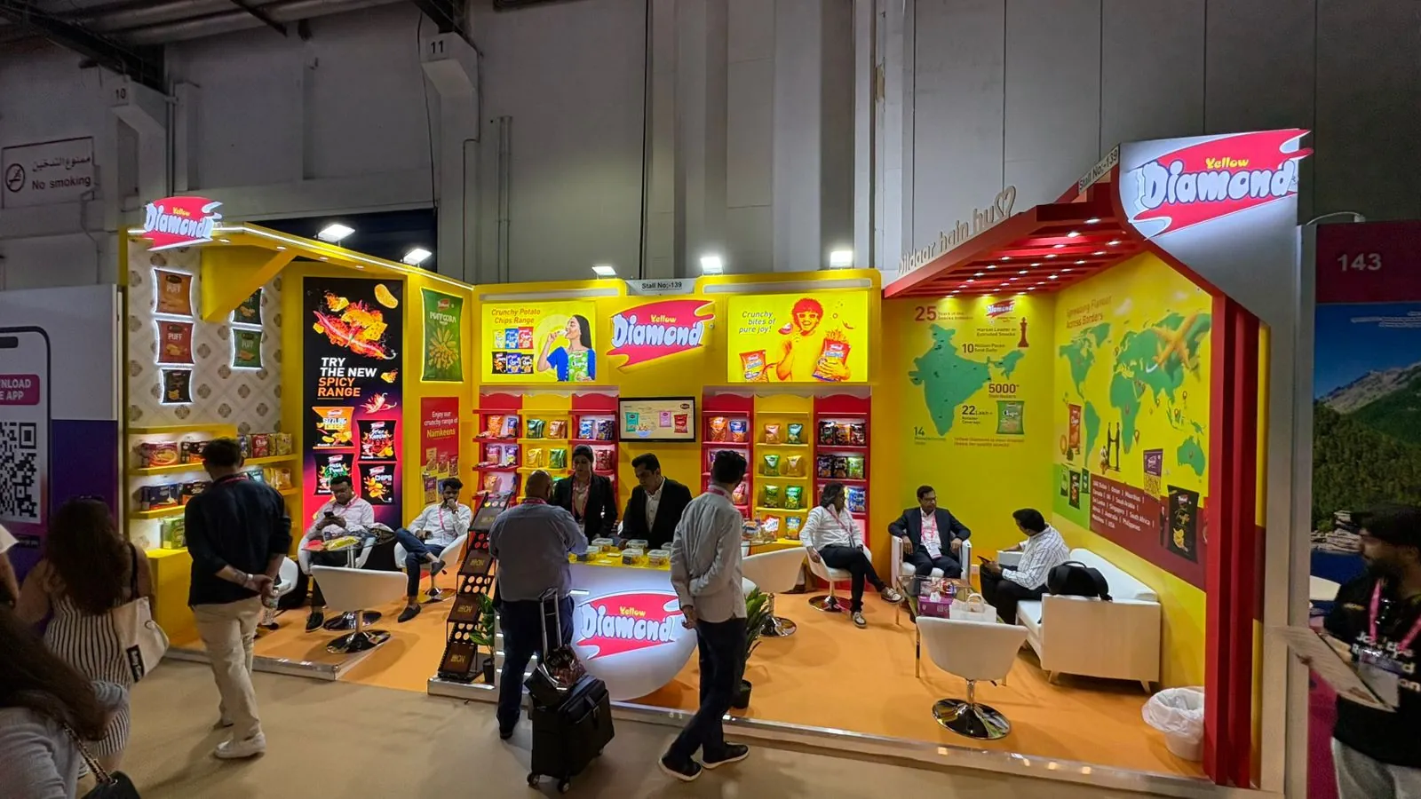 Diamond confectionery stand with world-map graphics at ISM Middle East 2025